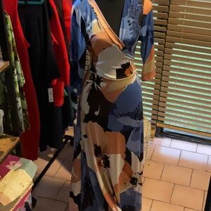 Multi- color long sleeve wrap dress in a size Xl